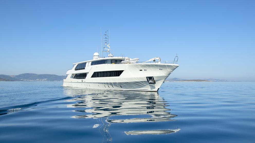 A luxury yacht on the idyllic sea under a blue sky off the coast of Bodrum.
